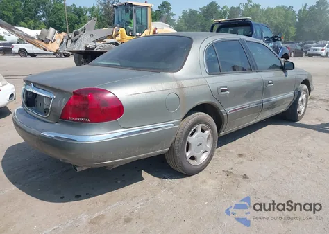 2000 Lincoln Continental z USA, uszkodzony, nr VIN 1LNHM97V0YY840446